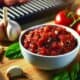 Bowl of Garlic and Smoked Tomato Salsa with fresh ingredients
