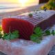 Smoking ahi tuna on a Himalayan salt block with coastal sides