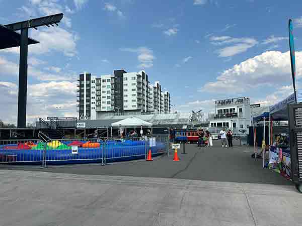 Kids' Zone with colorful rides at 2025 Rib Cook-Off