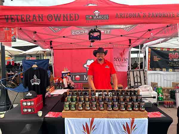 Tio Marcos booth showcasing veteran-owned Arizona salsas at 2025 Rib Cook-Off