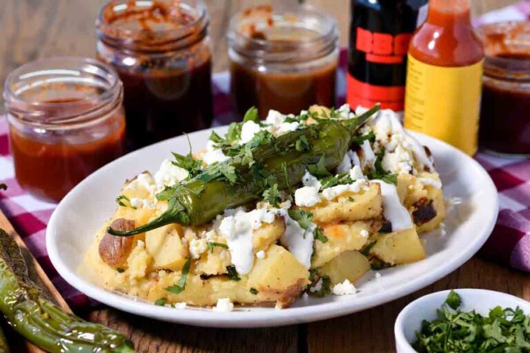 Diego “El Fuego” Morales’ spicy chile-Oaxaca mashed potatoes for BBQ – Yukon Golds with roasted Hatch chiles, melted Oaxaca cheese, Mexican crema, and fresh cilantro