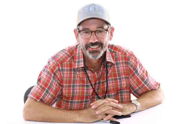 Tuffy Stone of Cool Smoke team at 2018 BBQ competition, perfecting ribs as a Kansas City Barbecue Society champion in American BBQ history.