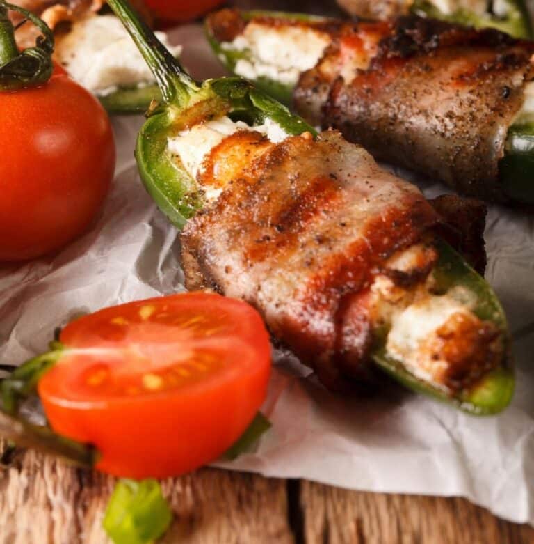 Bacon wrapped jalapeno poppers with melty cheese filling