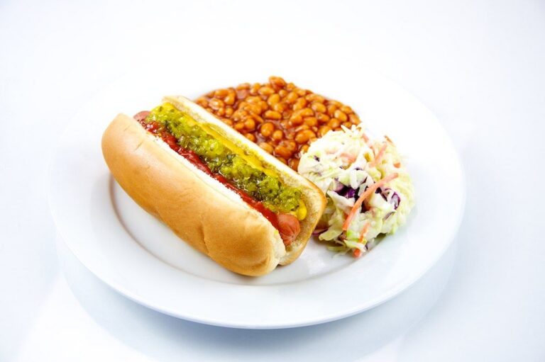 Smoky barbecue baked beans at a cookout — big green egg baked beans