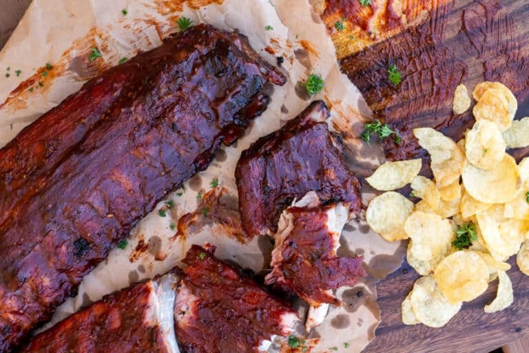 Rack of smoked baby back ribs sliced and glazed, competition style